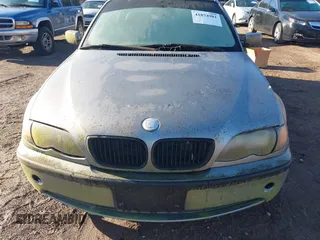 2004 BMW 3 Series 325i with VIN WBAEV33434KR33499, listed as a IAAI auction lot 41874981 with 216,828 mi miles. Bid and sale history available at carsss.com. Image 6.
