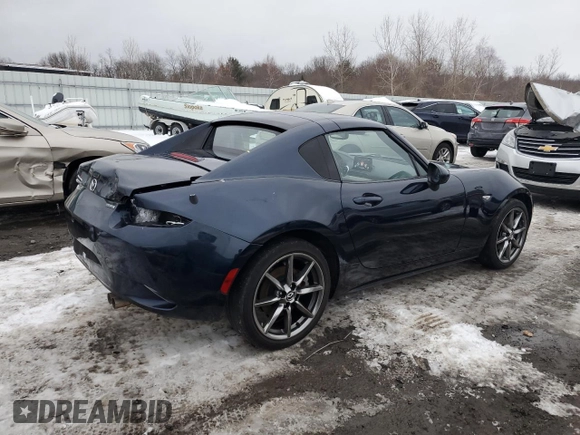 2021 Mazda MX-5 Miata Grand Touring with VIN JM1NDAM77M0454582, listed as a Copart auction lot 44959535 with 44,438 mi miles and Salvage title. Bid and sale history available at DreamBid. Image 3.