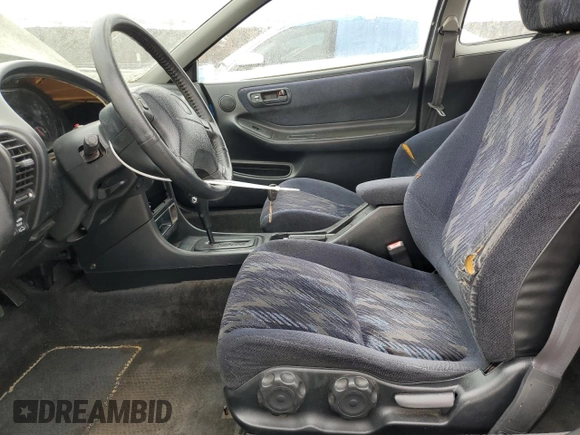 2000 Acura Integra LS with VIN JH4DC4454YS006940, listed as a Copart auction lot 54518205 with 191,509 mi miles and Salvage title. Bid and sale history available at DreamBid. Image 7.