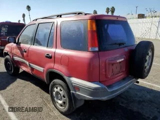 2001 Honda CR-V LX with VIN JHLRD284X1C006289, listed as a Copart auction lot 71057054 with 231,149 mi miles and Salvage Title. Bid and sale history available at carsss.com. Image 2.
