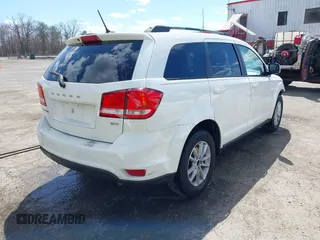 2017 Dodge Journey SXT with VIN 3C4PDCBB5HT564454, listed as a IAAI auction lot 41876498 with 198,035 mi miles and . Bid and sale history available at DreamBid. Image 4.