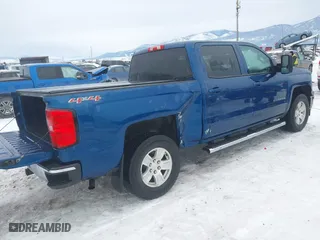 2015 Chevrolet Silverado 1500 LT with VIN 3GCUKREC5FG198758, listed as a IAAI auction lot 41573360 with 150,562 mi miles. Bid and sale history available at carsss.com. Image 4.