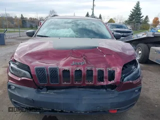 2019 Jeep Cherokee Trailhawk Elite with VIN 1C4PJMBX6KD378848, listed as a IAAI auction lot 40754408 with 52,901 mi miles. Bid and sale history available at carsss.com. Image 6.