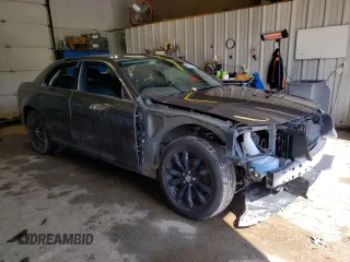 2016 Chrysler 300 Limited with VIN 2C3CCARG2GH157081, listed as a Copart auction lot 51031965 with 127,521 mi miles and Salvage Title. Bid and sale history available at DreamBid. Image 4.