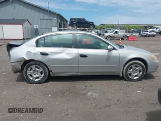 2003 Nissan Altima S z VIN 1N4AL11D63C136161, wystawiony jako IAAI lot #42461610 z przebiegiem 248 121 mil mil oraz . Historia ofert i sprzedaży dostępna na DreamBid. Obrazek 14.