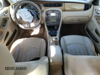 2007 Jaguar X-Type z VIN SAJWA51A07WJ14424, wystawiony jako Copart lot #84556864 z przebiegiem Nie podano mil oraz Szkody całkowita. Historia ofert i sprzedaży dostępna na DreamBid. Obrazek 8.