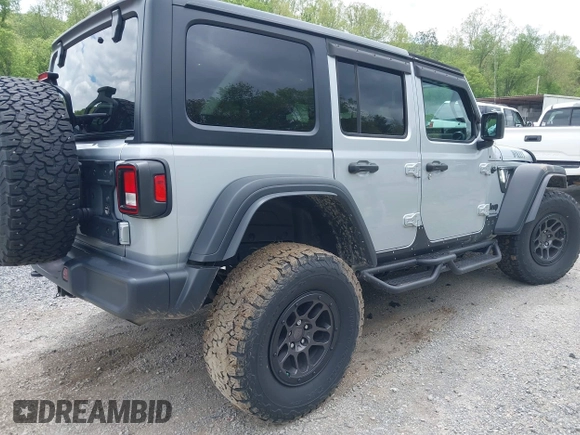 2023 Jeep Wrangler Sport S с VIN 1C4HJXDN0PW511682, выставлен на аукционе IAAI как лот 42199890 с пробегом 29 061 миль миль и . История ставок и продаж доступна на DreamBid. Изображение 4.
