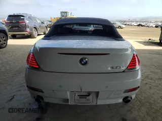 2006 BMW 6 Series 650Ci z VIN WBAEK134X6CN77921, wystawiony jako Copart lot #54093355 z przebiegiem 162 363 mil mil oraz Czysty tytuł • Clean title. Historia ofert i sprzedaży dostępna na DreamBid. Obrazek 6.