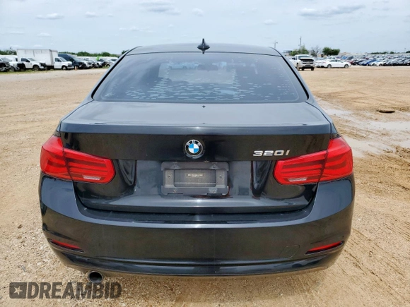 2018 BMW 3 Series 320i with VIN WBA8A9C56JAH12021, listed as a Copart auction lot 58971175 with 100,317 mi miles and Salvage title. Bid and sale history available at DreamBid. Image 6.