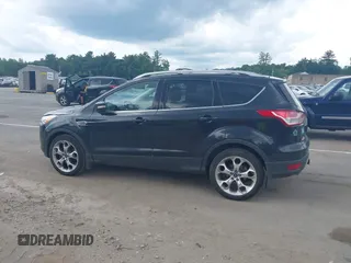 2015 Ford Escape Titanium with VIN 1FMCU9J92FUA96987, listed as a IAAI auction lot 42678423 with 188,956 mi miles and . Bid and sale history available at DreamBid. Image 14.