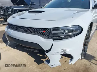 2021 Dodge Charger GT with VIN 2C3CDXHG7MH603660, listed as a IAAI auction lot 41910624 with 49,394 mi miles and . Bid and sale history available at DreamBid. Image 6.