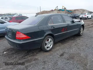 2005 Mercedes-Benz S-Class 5.0L with VIN WDBNG84J15A455944, listed as a IAAI auction lot 42020939 with 111,672 mi miles. Bid and sale history available at carsss.com. Image 4.