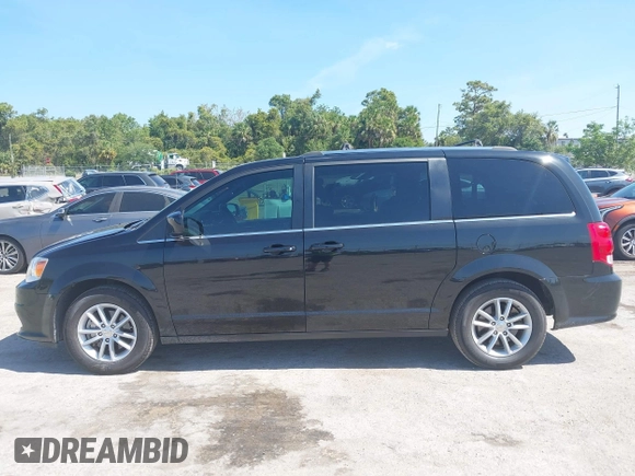 2019 Dodge Grand Caravan SXT with VIN 2C4RDGCG5KR739144, listed as a IAAI auction lot 42175888 with 43,577 mi miles and . Bid and sale history available at DreamBid. Image 14.