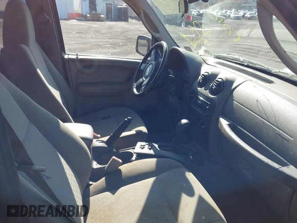 2005 Jeep Liberty Sport with VIN 1J4GL48K85W700799, listed as a IAAI auction lot 42054433 with 166,989 mi miles. Bid and sale history available at carsss.com. Image 5.