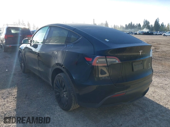 2023 Tesla Model Y Long Range z VIN 7SAYGDEE9PF637042, wystawiony jako IAAI lot #41969086 z przebiegiem 25 524 mil mil oraz . Historia ofert i sprzedaży dostępna na DreamBid. Obrazek 3.