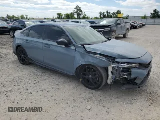 2022 Honda Civic Si z VIN 2HGFE1E58NH474272, wystawiony jako Copart lot #52454135 z przebiegiem 76 380 mil mil oraz Szkody całkowita. Historia ofert i sprzedaży dostępna na DreamBid. Obrazek 4.