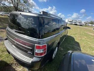 2016 Ford Flex SEL z VIN 2FMGK5C83GBA09724, wystawiony jako Copart lot #80993314 z przebiegiem 188 103 mil mil oraz Czysty tytuł • Clean title. Historia ofert i sprzedaży dostępna na DreamBid. Obrazek 4.