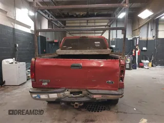 2002 Ford Super Duty F-250 XL with VIN 1FTNX21L82EA87027, listed as a IAAI auction lot 41893004 with 214,580 mi miles. Bid and sale history available at carsss.com. Image 16.