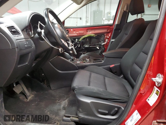 2016 Mazda CX-5 Touring z VIN JM3KE4CY6G0647362, wystawiony jako Copart lot #58081855 z przebiegiem 86 372 mil mil oraz Szkoda całkowita • Salvage title. Historia ofert i sprzedaży dostępna na DreamBid. Obrazek 7.