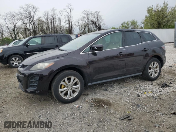 2011 Mazda CX-7 S Touring z VIN JM3ER4CL4B0371150, wystawiony jako Copart lot #52794945 z przebiegiem 147 856 mil mil oraz Czysty tytuł • Clean title. Historia ofert i sprzedaży dostępna na DreamBid. Obrazek 1.