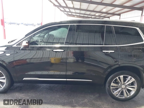 2020 Cadillac XT6 FWD Premium Luxury with VIN 1GYKPCRS9LZ177120, listed as a IAAI auction lot 41608960 with 63,109 mi miles and . Bid and sale history available at DreamBid. Image 14.