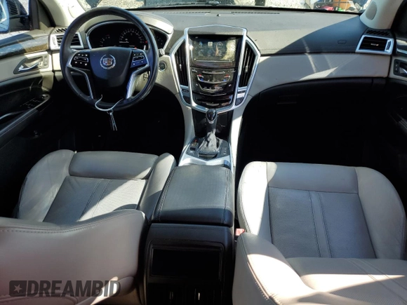 2013 Cadillac SRX Performance Collection with VIN 3GYFNHE37DS649235, listed as a Copart auction lot 56939285 with 104,692 mi miles and Salvage title. Bid and sale history available at DreamBid. Image 8.