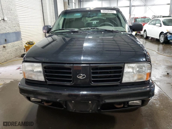 2001 Oldsmobile Bravada with VIN 1GHDT13W912194316, listed as a Copart auction lot 49438485 with 124,380 mi miles and Salvage Title. Bid and sale history available at carsss.com. Image 5.