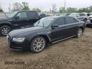 2015 Audi A8 4.0T z VIN WAU32AFD6FN037523, wystawiony jako Copart lot #59757555 z przebiegiem 146 463 mil mil oraz Czysty tytuł • Clean title. Historia ofert i sprzedaży dostępna na DreamBid. Obrazek 1.