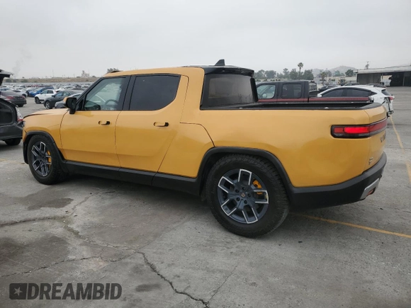 2022 Rivian R1T Launch Edition z VIN 7FCTGAAL2NN011755, wystawiony jako Copart lot #59934185 z przebiegiem 12 261 mil mil oraz Szkoda całkowita • Salvage title. Historia ofert i sprzedaży dostępna na DreamBid. Obrazek 2.
