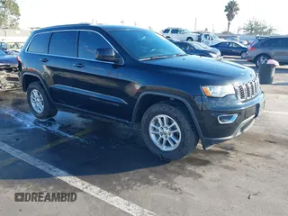 2018 Jeep Grand Cherokee Altitude with VIN 1C4RJEAGXJC192976, listed as a IAAI auction lot 41372728 with 104,607 mi miles and . Bid and sale history available at DreamBid. Image 1.
