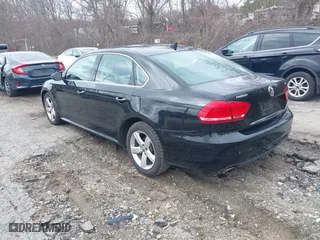 2012 Volkswagen Passat SE with VIN 1VWBP7A38CC033611, listed as a IAAI auction lot 41855933 with 155,429 mi miles. Bid and sale history available at carsss.com. Image 3.