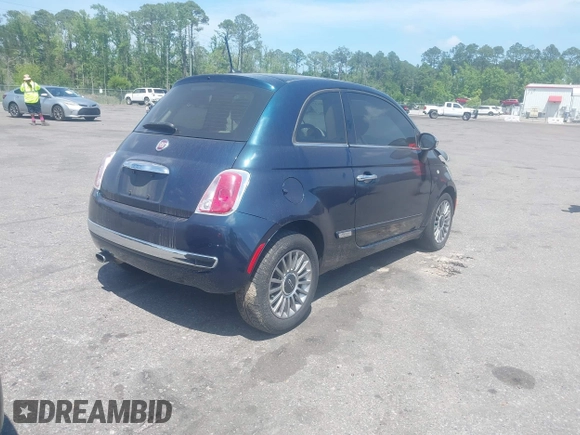 2013 FIAT 500 Lounge with VIN 3C3CFFCR6DT663496, listed as a IAAI auction lot 42030837 with 68,904 mi miles and . Bid and sale history available at DreamBid. Image 4.