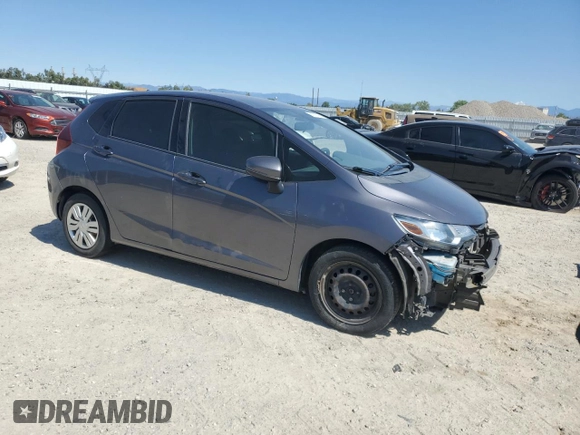 2015 Honda Fit LX z VIN 3HGGK5G52FM719166, wystawiony jako Copart lot #61162425 z przebiegiem 172 075 mil mil oraz Czysty tytuł • Clean title. Historia ofert i sprzedaży dostępna na DreamBid. Obrazek 4.