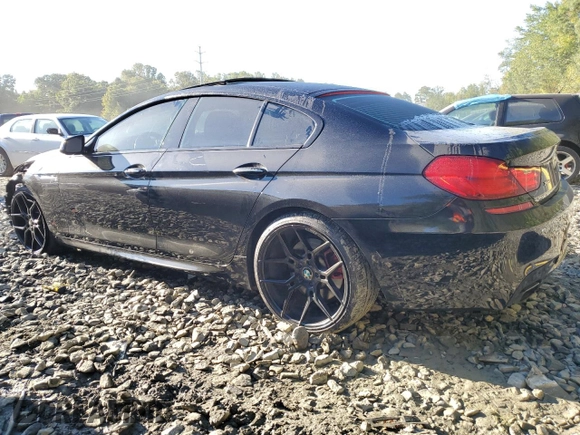 2014 BMW 6 Series 650i xDrive z VIN WBA6B4C54ED371520, wystawiony jako Copart lot #75107784 z przebiegiem 136 077 mil mil oraz Szkoda całkowita • Salvage title. Historia ofert i sprzedaży dostępna na DreamBid. Obrazek 2.