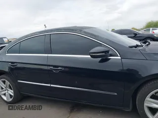 2013 Volkswagen CC Sport with VIN WVWBP7AN6DE504679, listed as a IAAI auction lot 42034362 with 148,527 mi miles. Bid and sale history available at carsss.com. Image 14.