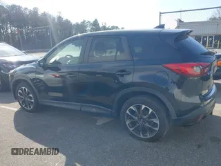 2016 Mazda CX-5 Grand Touring with VIN JM3KE4DY5G0681436, listed as a IAAI auction lot 41664780 with 172,199 mi miles. Bid and sale history available at carsss.com. Image 14.