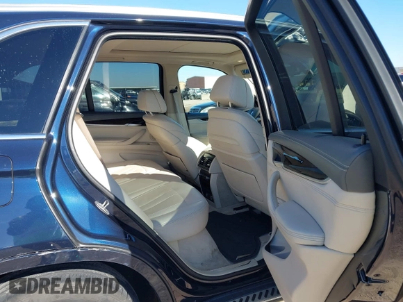 2016 BMW X5 sDrive35i with VIN 5UXKR2C55G0R71330, listed as a IAAI auction lot 41661140 with 128,457 mi miles. Bid and sale history available at carsss.com. Image 8.