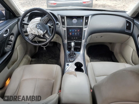 2015 Infiniti Q50 Premium z VIN JN1BV7ARXFM409465, wystawiony jako Copart lot #57295785 z przebiegiem 144 328 mil mil oraz Szkoda całkowita • Salvage title. Historia ofert i sprzedaży dostępna na DreamBid. Obrazek 8.