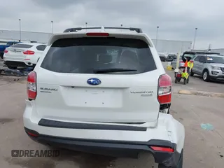 2016 Subaru Forester Touring z VIN JF2SJAVC2GH465083, wystawiony jako IAAI lot #42287323 z przebiegiem Nie podano mil oraz . Historia ofert i sprzedaży dostępna na DreamBid. Obrazek 16.