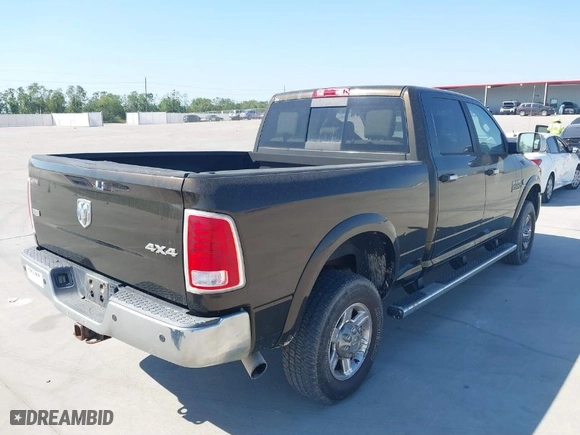 2013 Ram 2500 Laramie with VIN 3C6UR5FL7DG529590, listed as a IAAI auction lot 40608177 with 141,594 mi miles. Bid and sale history available at carsss.com. Image 4.