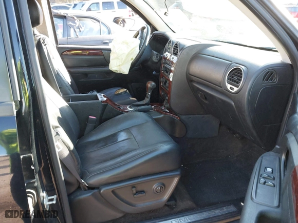 2005 GMC Envoy SLE with VIN 1GKDS13S152246568, listed as a IAAI auction lot 41293887 with 315,882 mi miles. Bid and sale history available at carsss.com. Image 5.