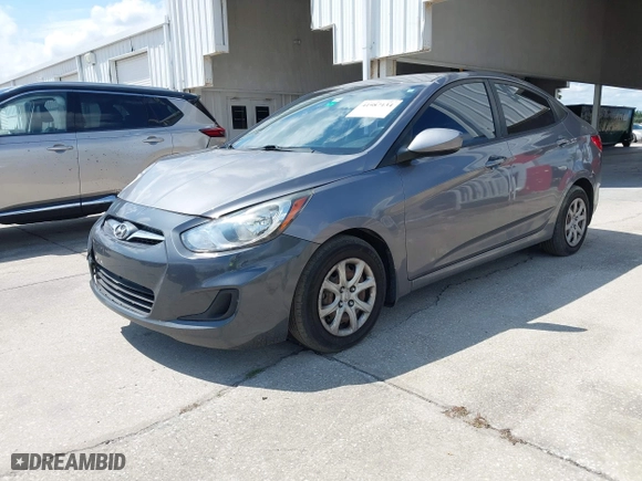 2014 Hyundai Accent GLS with VIN KMHCT4AE4EU661497, listed as a IAAI auction lot 41987134 with 129,508 mi miles. Bid and sale history available at carsss.com. Image 17.