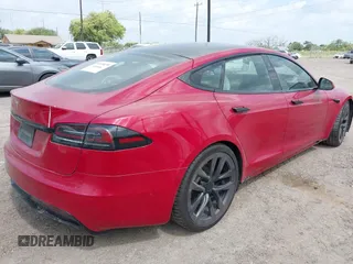2022 Tesla Model S with VIN 5YJSA1E58NF486727, listed as a IAAI auction lot 42139418 with Not provided miles and . Bid and sale history available at DreamBid. Image 4.
