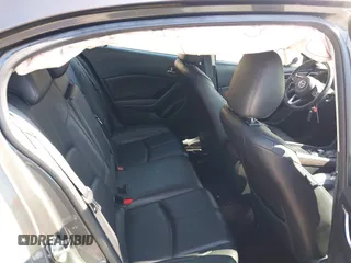 2018 Mazda 3 Touring z VIN 3MZBN1L38JM243749, wystawiony jako IAAI lot #41771812 z przebiegiem 65 533 mil mil oraz . Historia ofert i sprzedaży dostępna na DreamBid. Obrazek 8.