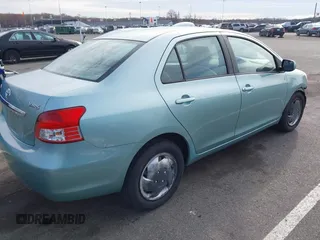2009 Toyota Yaris with VIN JTDBT903794060474, listed as a IAAI auction lot 42005903 with 104,607 mi miles. Bid and sale history available at carsss.com. Image 4.