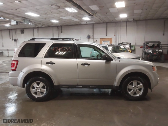 2010 Ford Escape XLT with VIN 1FMCU0DG5AKB02811, listed as a IAAI auction lot 41749335 with 103,071 mi miles. Bid and sale history available at carsss.com. Image 13.