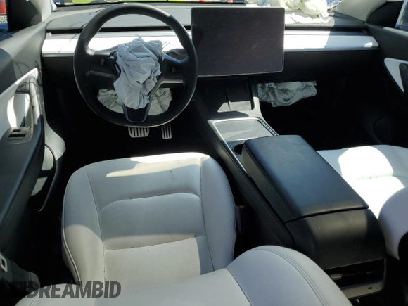 2022 Tesla Model Y Performance z VIN 7SAYGDEF2NF461103, wystawiony jako Copart lot #52198205 z przebiegiem 33 576 mil mil oraz Szkoda całkowita • Salvage title. Historia ofert i sprzedaży dostępna na DreamBid. Obrazek 8.