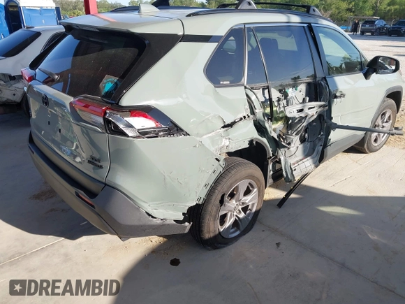 2022 Toyota RAV4 Hybrid XLE with VIN JTMRWRFV9NJ054668, listed as a IAAI auction lot 42606261 with 61,794 mi miles and . Bid and sale history available at DreamBid. Image 4.