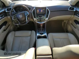 2014 Cadillac SRX Premium Collection z VIN 3GYFNGE34ES687663, wystawiony jako Copart lot #85854534 z przebiegiem 193 653 mil mil oraz Szkody całkowita. Historia ofert i sprzedaży dostępna na DreamBid. Obrazek 8.