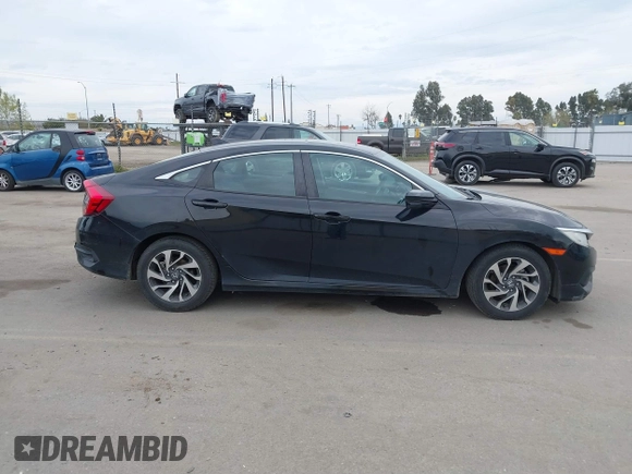 2018 Honda Civic EX with VIN 2HGFC2F75JH583892, listed as a IAAI auction lot 41697605 with 134,675 mi miles and . Bid and sale history available at DreamBid. Image 13.